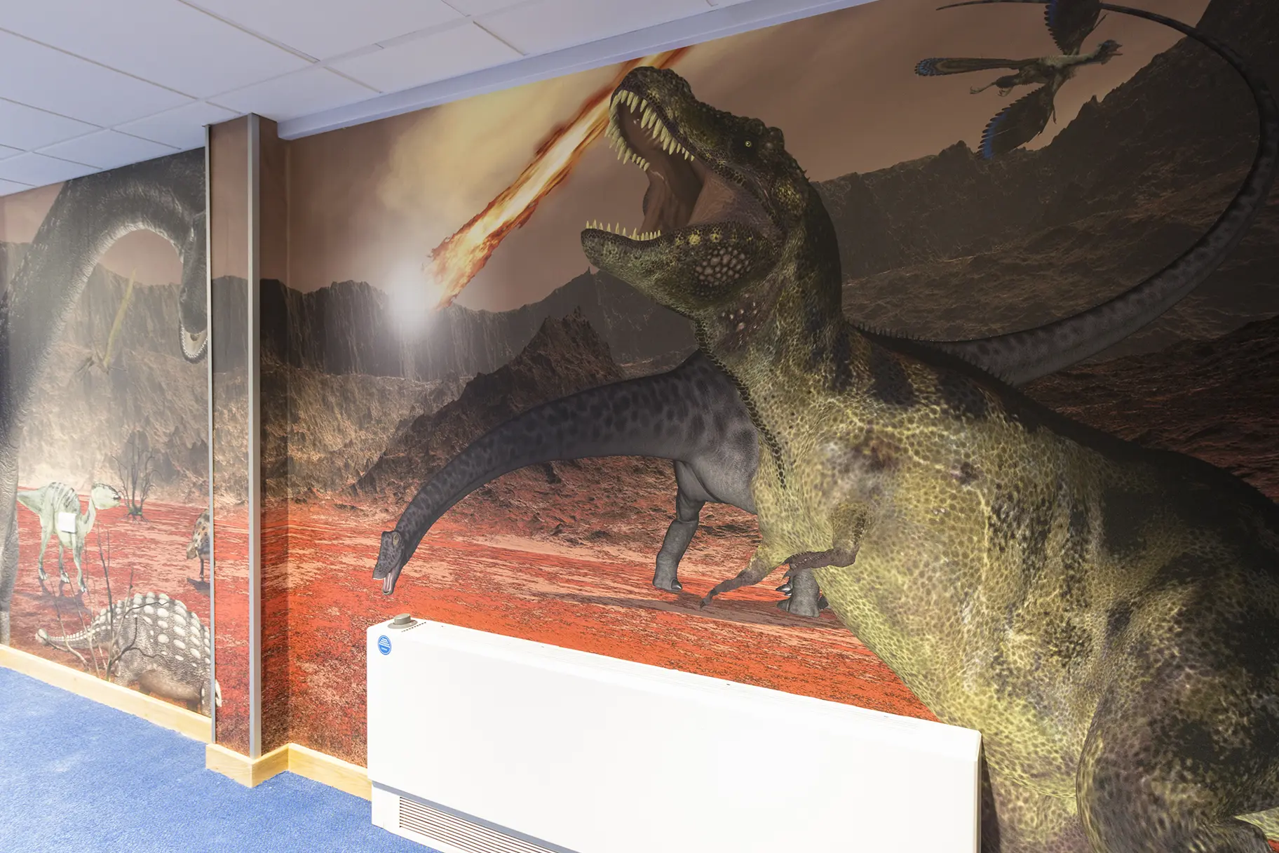 Large format bespoke designed dinosaur themed corridor wall art
